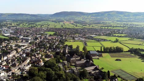 Denbighshire-residential-suburban-North-Wales-countryside-housing-estate-aerial-view-right-pan-shot
