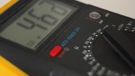 Numbers-jumping-up-and-down-on-electronic-multimeter