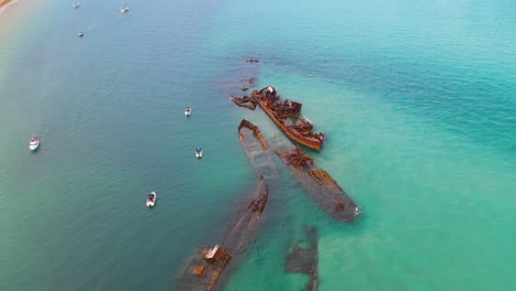 Tangalooma-shipwrecks-off-Moreton-Island-coast,-Australia,-aerial-view