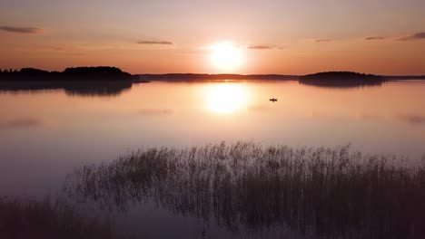Sunset-Over-Lake-Aerial.-Slow-Rise-Shot