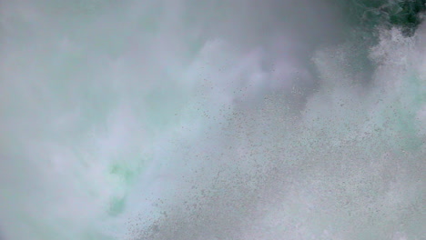 Ultra-slow-motion-close-up-of-Yellowstone-River's-Upper-Falls-water-cascade-and-mist-plume