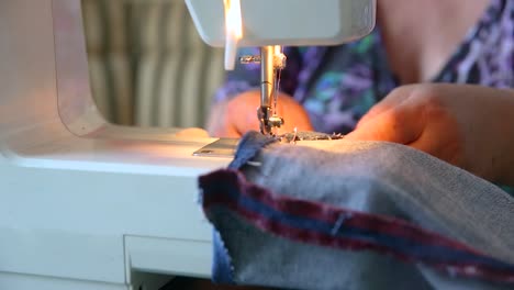 Seamstress-using-sewing-machine,-essential-ability,-basic-household-chore