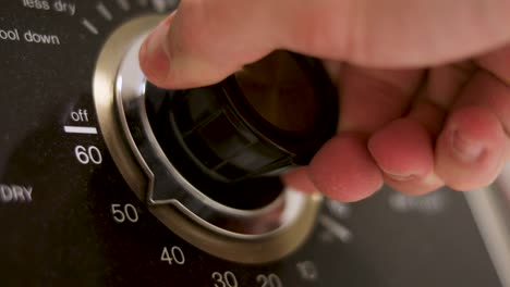 Old-Fashioned-Drying-Laundry-Machine-Dial-Turning-to-60-Minutes,-Extreme-Close-up