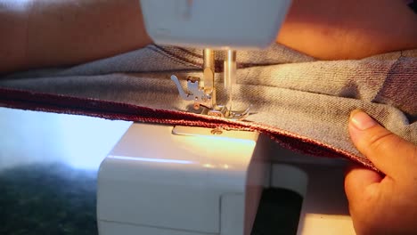 Sewing-denim-material-on-the-electric-machine-process