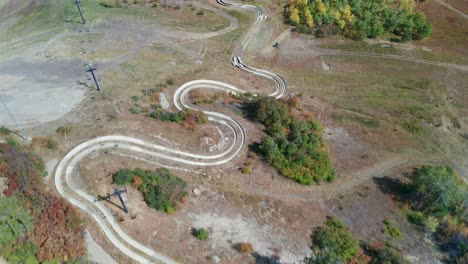 Aerial-footage-of-the-Alpine-slide-located-on-the-side-of-Emerald-Mountain-in-Steamboat-Springs,-Colorado-part-1-of-2