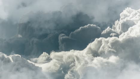 Cumulus-cloud,-a-thunderstorm-between-dark-and-light-clouds