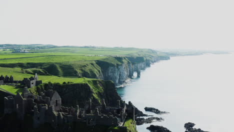 Tilt-up-shot-of-the-Dunluce-Castle-in-Northern-Ireland-during-a-bright-day