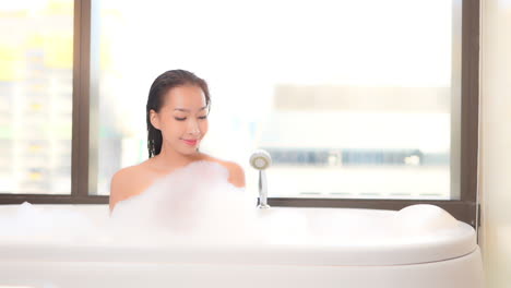 Gorgeous-stoic-asian-beauty-bubble-bathing