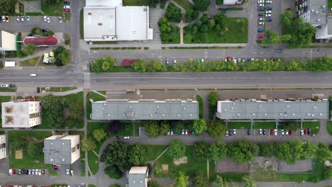 Aerial:-Birds-eye-view-from-a-suburban-area-with-flats-and-houses