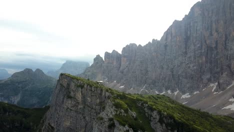 Green-Valley-Mountain-ridge-on-a-cloudy-day-at-Refugio-Tisse-near-Alleghe-village,-Dolomites,-Italy