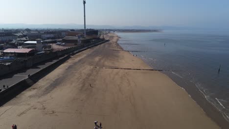 Popular-seaside-Rhyl-holiday-resort-town-aerial-view-above-coastal-beach-waterfront
