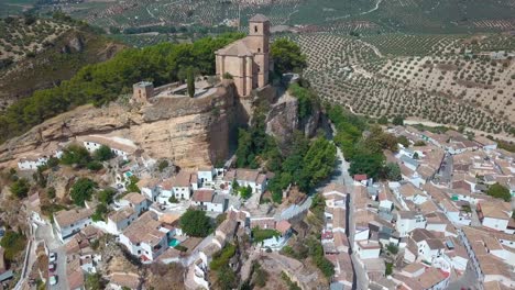 Aerial-view-of-the-church-and-castle-of-Montefrio-in-Granada-in-the-top-of-the-rock