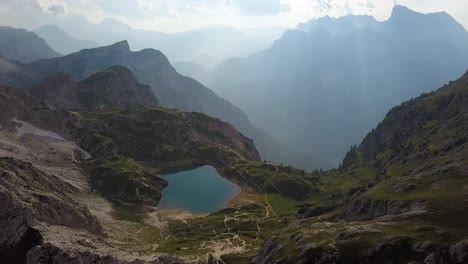 Small-Lake-in-the-middle-of-a-high-mountain-range-peak,-Lago-di-Coldai,-Alleghe,-South-tyrol