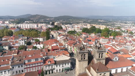 Panorama-Of-The-City-Of-Braga-With-Traditional-Red-Tile-Roof-Houses-From-The-Braga-Cathedral-On-A-Sunny-Summer-Day-In-Portugal