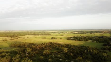 Aerial-rising-over-Kansas-farmland-in-the-summertime