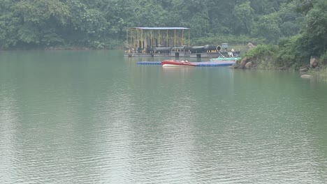 Boats-lying-at-boat-station-at-Massanjore-Dam-at-Dumka-in-Jharkhand,-India