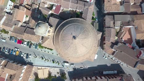 Aerial-overhead-shot-of-the-church-of-Concepcion-in-Montefrio,-a-unique-church-in-Spain
