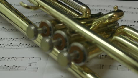 Brass-trumpet-lying-on-sheet-music.-SLIDER-SHOT