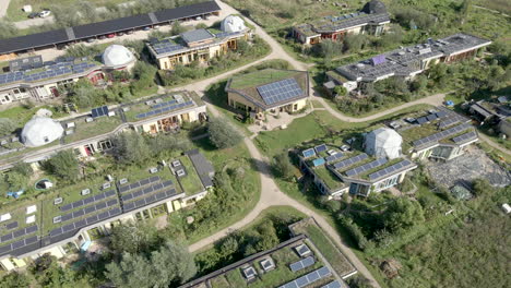aerial-of-green-earthship-village-in-Olst,-the-Netherlands