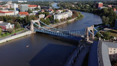 Aerial-shot-of-the-Grunwald-Bridge-over-the-river-Oder-in-the-city-of-Wroclaw,-Poland