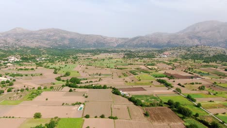 Aerial-shot-of-agriculture-farm-fields-in-Lastihi,-Crete,-Greece