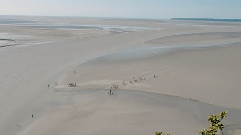 Aerial-view-of-Mont-Saint-Michel-Tide-from-the-top-of-the-hill,-France
