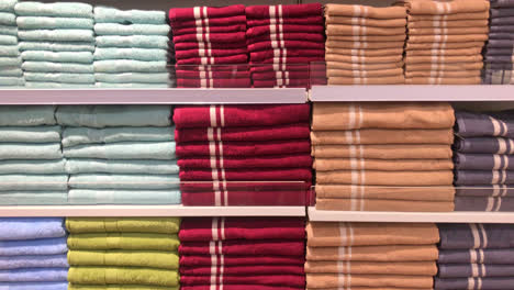 colorful-towel-on-shelf-in-retail-store