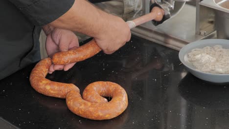 Using-a-sausage-stuffer-to-make-Hungarian-sausage