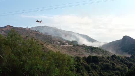 Firefighting-Plane-Dropping-Water-in-Mountains