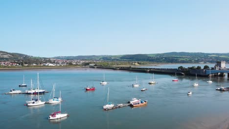 Aerial-view-of-boats-docked-in-the-seaside-town-of-Conwy-in-Wales