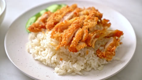 Hainanese-chicken-rice-with-fried-chicken-or-rice-steamed-chicken-soup-with-fried-chicken---Asian-food-style
