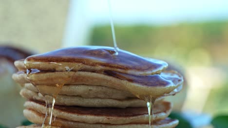 Maple-Syrup-Dripping-Over-The-Stack-Of-Delicious-Pancakes-For-Breakfast