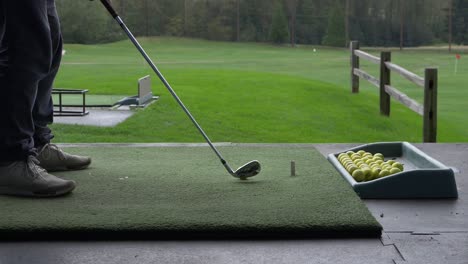 hitting-the-ball-using-an-iron-at-the-driving-range
