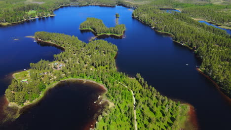 Beautiful-Island-Landscape-Of-Busjön,-Vansbro,-Sweden---aerial-shot
