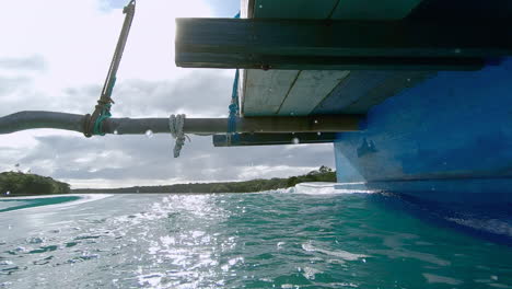POV-underwater-shot-of-Kanak-pirogue-sailing