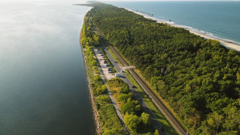 Aerial-slow-motion-drone-shot-Hel-Peninsula,-road-between-Sea-Baltic-and-Gulf-of-Gdansk,-cinematic-footage