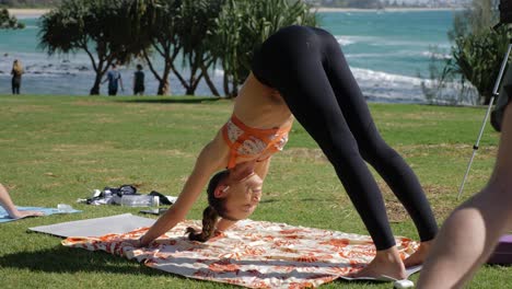 Slim-Girl-Practicing-Yoga-On-Mat-Doing-Downward-Dog-Pose---Downward-facing-Dog-Pose---Burleigh-Hill-And-Beach-In-Summer---Gold-Coast,-QLD,-Australia