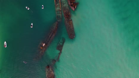 Aerial-view:-Moreton-Island-Tangalooma-shipwrecks,-Australia,-top-down