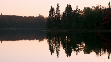 Tree-Reflections-On-Tranquil-Lake-At-Dusk