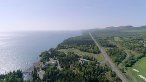 Ariel-Of-Car-Driving-Along-The-North-Shore-Of-Lake-Superior
