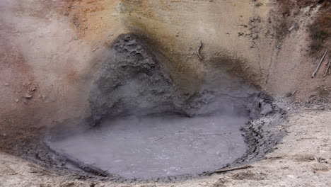 Geothermal-mud-pot-steams-and-boils-at-Yellowstone-National-Park