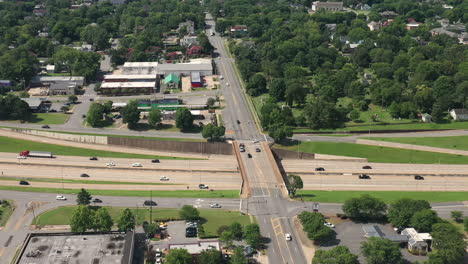 Aerial-View-of-Highway-and-Overpass-Car-Traffic-by-Little-Rock-City-Arkansas-USA-On-Sunny-Summer-Day,-Drone-Shot