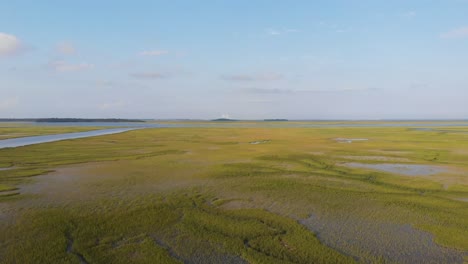 Aerial-View-of-Marshland-in-South-Georgia-with-Sidney-Lanier-Bridge-in-Background