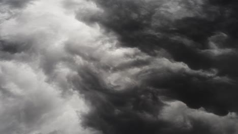point-of-view,-dark-gray-aerial-clouds-with-thunderstorms-in-them
