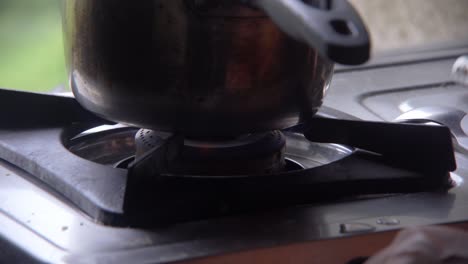 lighting-up-the-stove-in-kitchen-India-for-tea