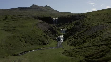 Aerial-of-popular-tourist-attraction-Sheeps-Waterfall-in-Iceland,-Selvallafoss