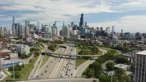 Vehicles-Driving-on-Kennedy-Expressway-toward-Downtown-Chicago,-Birds-Eye-View
