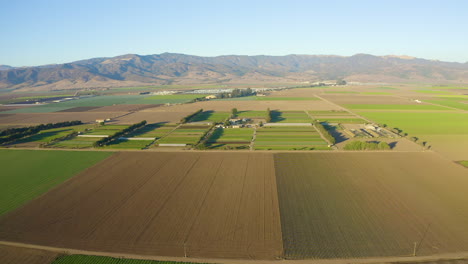 Aerial-over-farm-land-in-Salinas-Valley,-CA