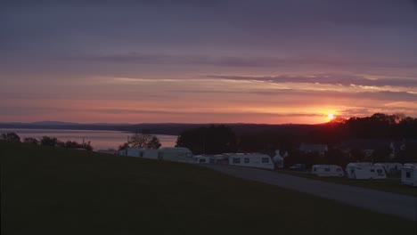 Time-lapse-of-amazing-colorful-sunrise-over-New-Quay-campsite