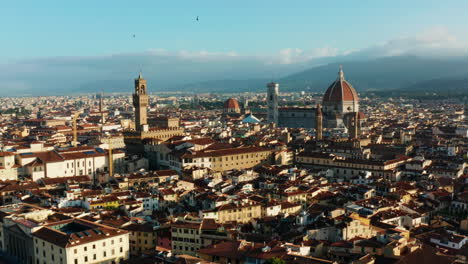 Wide-aerial-pan-over-Florence,-Italy